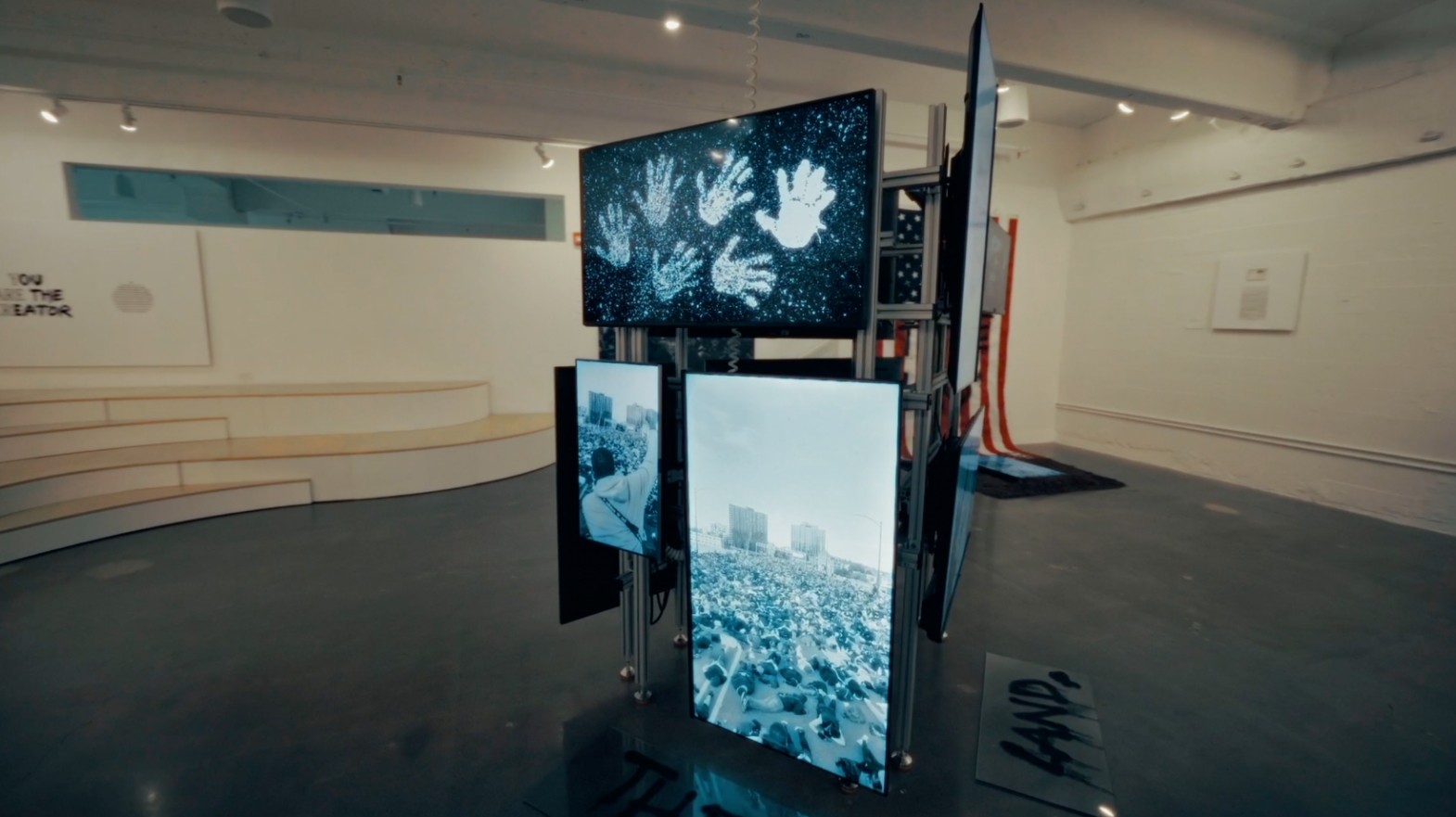 Video screens on video installation show Josue's work