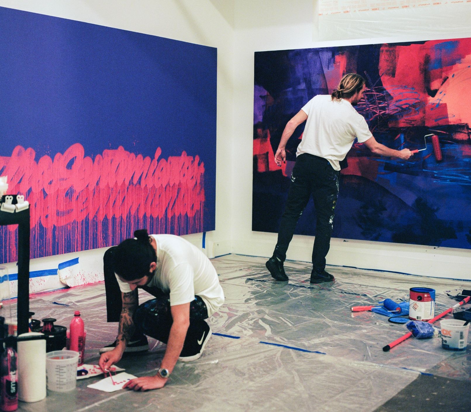 Madsteez and Its a Living paint large canvases on corner walls